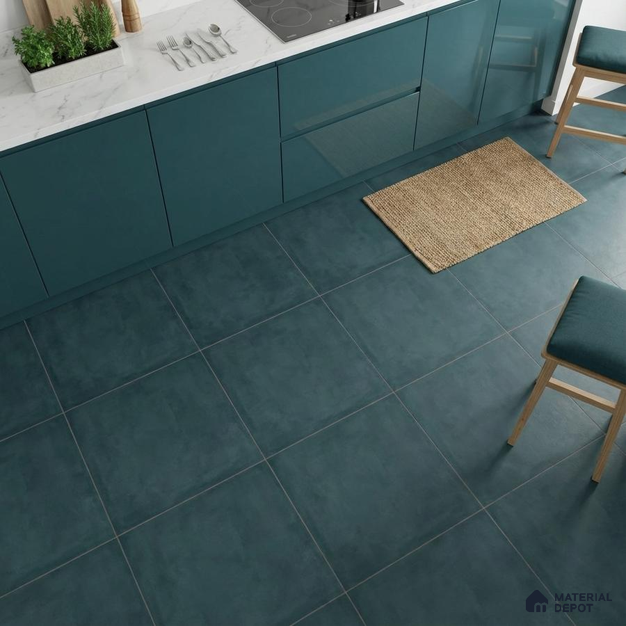 Modern kitchen with teal blue high gloss laminate cabinets and teal ceramic floor tiles with white marble countertop