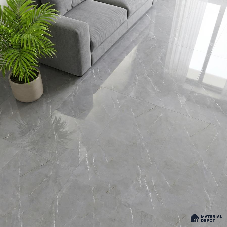 Modern living room with grey marble-look polished floor tiles and grey fabric sofa