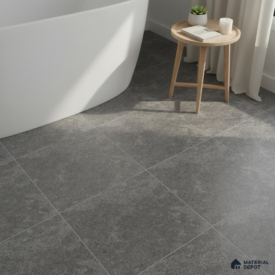 Minimalist bathroom with grey stone-look floor tiles and freestanding tub