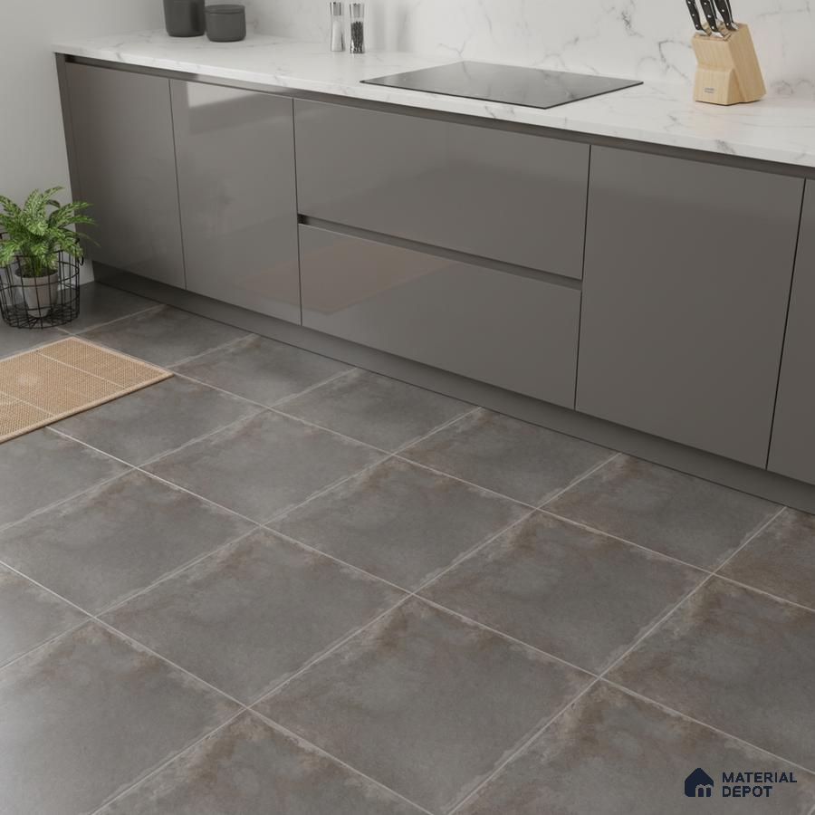 Modern kitchen with grey high gloss laminate cabinets, white marble-look quartz countertop, and matte grey stone floor tiles
