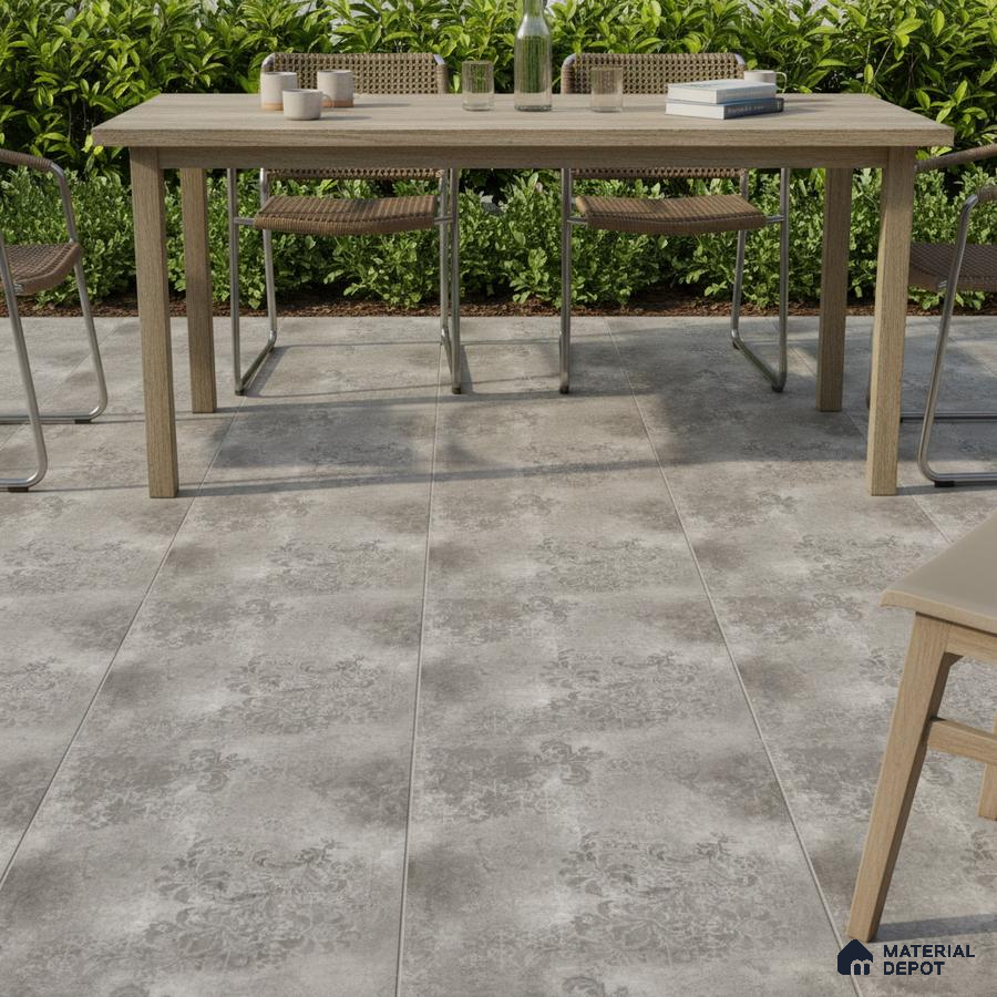 Modern outdoor dining with light oak table and grey patterned floor tiles