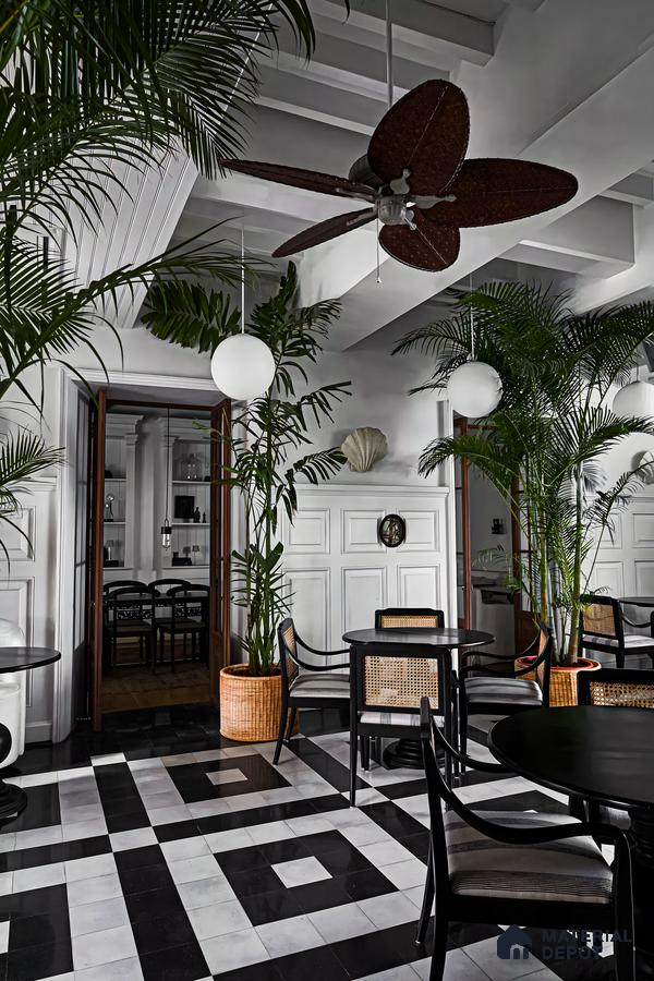 Tropical-Inspired Indoor Space with Black and White Checkerboard Tiles | Material Depot