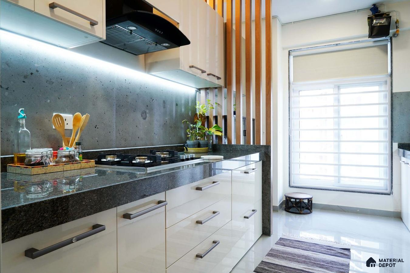Mumbai Elegance: Glossy Parallel Kitchen in Modern 2 BHK