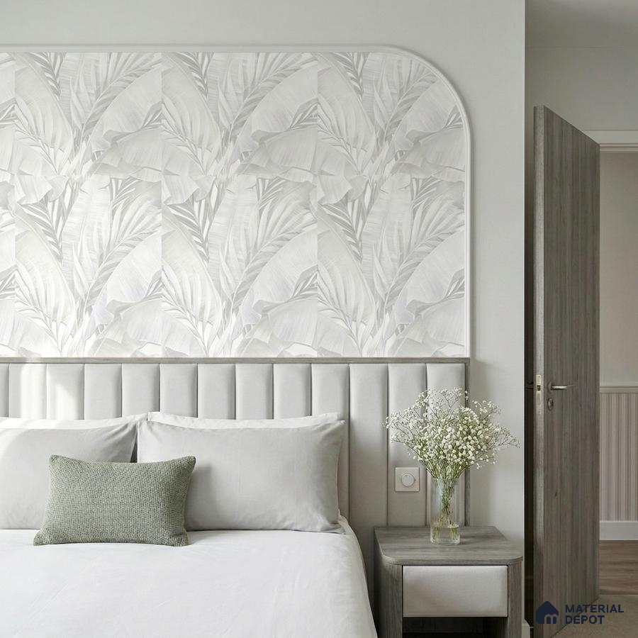 Minimalist bedroom with grey suede upholstered headboard and tropical patterned wallpaper accent wall