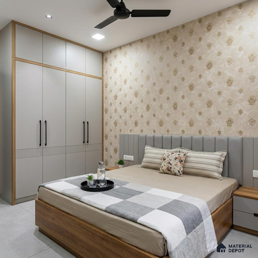 Modern bedroom with beige floral wallpaper, grey solid laminate wardrobe, and wood finish bed